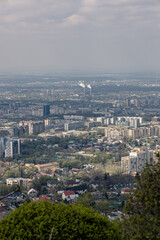 Obraz premium Environmental problems of large cities. Smog over the city of Almaty in Kazakhstan.