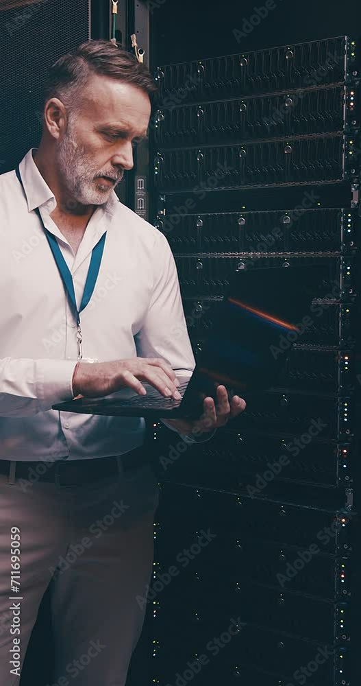 Poster Mature man in data center with laptop, engineering or network maintenance in digital storage for database update. Tech employee, system administration and technician online in server room on computer