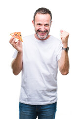 Middle age hoary senior man eating pizza slice over isolated background screaming proud and celebrating victory and success very excited, cheering emotion