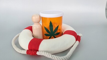 Symbol of marijuana and helping people with cancer