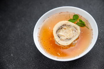 bones bouillon beef broth first course fresh healthy eating cooking appetizer meal food snack on the table copy space food background rustic top view 
