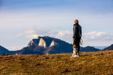 spending time with a dog during a mountain hike