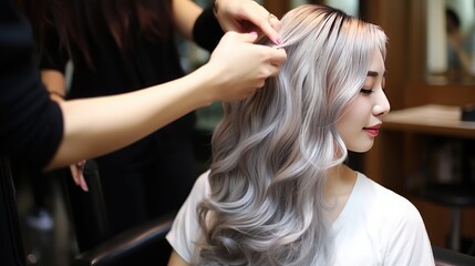 Fototapeta premium Hairdresser working on haircut and hairstyle for client at beauty salon, trendy hairs designs