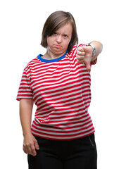 Young adult woman with down syndrome over isolated background looking unhappy and angry showing rejection and negative with thumbs down gesture. Bad expression.