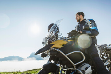 man on a motorcycle in the mountains. Achenkirch, Austria