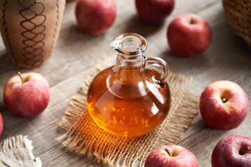 Apple cider vinegar in a glass bottle