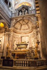 The Cathedral of Pisa in Pisan-Romanesque style. The picture shows the main nave with the altar,...