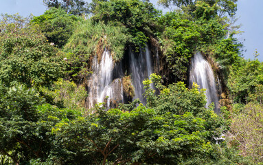 Obraz premium A gorgeous waterfall captured in long exposure, Thailand.