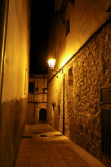 Historical facades and streets of The ancient city of Cuenca at night