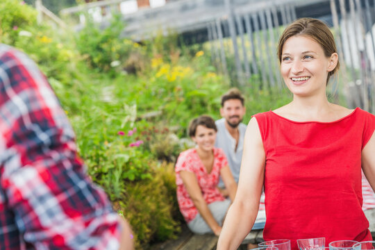 happy family in the garden in the mountains