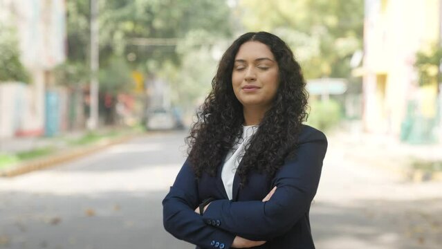 Confident Indian Businesswoman With Curly Hair