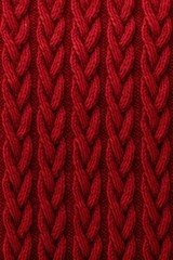 Cozy and comforting seamless pattern featuring a warm and inviting knit sweater texture in a soft red color