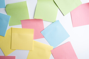 Mockup of many blank colorful office stickers on a colored background. Place for text. Concept ideas and notes
