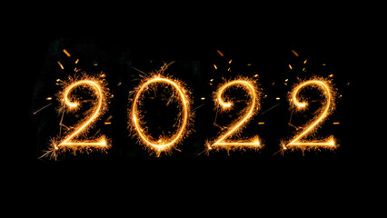 light number Happy New Year 2022. Sparkling burning text Happy New Year 2022 isolated on black background