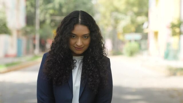 Shy Curly Hair Indian Businesswoman