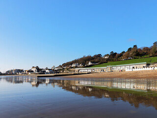 Fototapeta premium Seafront Reflections at Lyme Regis January 2024 