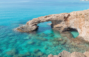 The bridge of love. Natural stone bridge near Ayia Napa on Cyprus. 
Mediterranean sea.