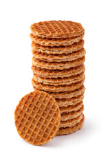 Stack of fresh baked mini stroopwafels, syrup waffles, isolated on white background close up