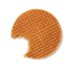 Single fresh baked stroopwafel, syrup waffle, with a bite out of it isolated on white background...
