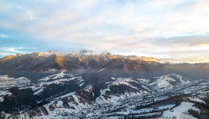 Fototapeta premium Aerial view of the Bucegi Mountains in Romania in winter