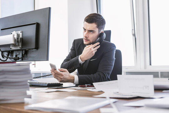 business manager working in his office with a view