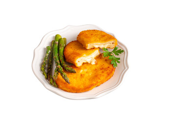 Cordon bleu served with asparagus.