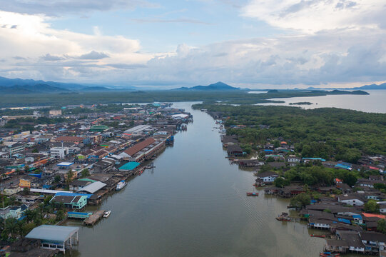 Aerial view of Ranong City, The Floating village urban city town houses, lake sea or river. Nature landscape fisheries and fishing tools, Thailand. Aquaculture farming
