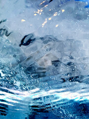 Wavy texture of blue ice