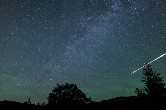 Meteor Fireball Streaks Across the Night Sky in a Flash
