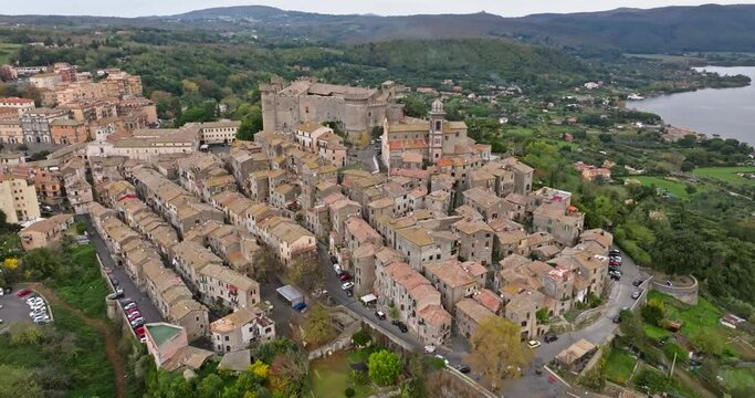Aerial view of the landscape of the village on top of Mount Bracciano, Italy. Beautiful cityscape of ancient streets with old houses. High quality 4k footage