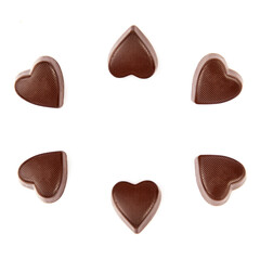 Chocolate candies isolated on white. Free space for text.