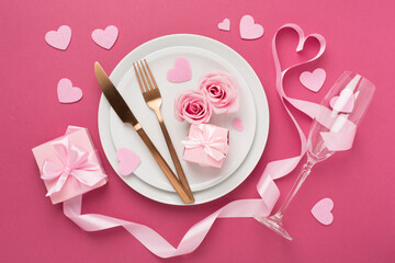 Festive table setting for Valentine's Day on color background, top view