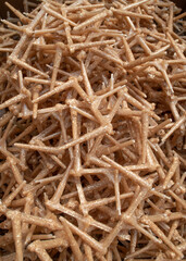 Recycling, reuse of plastic mixed with sawdust. Sprues for plastic products. Recycled shredded plastic. Various new types of colored plastic and environmentally friendly injection molding materials.