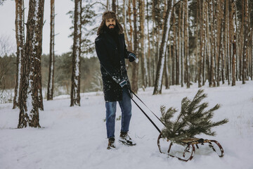 bearded man and xmas tree sliding