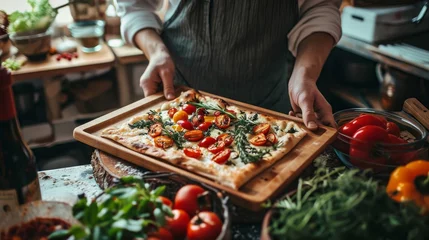 Foto op Plexiglas Hipster blogger or cook holds wooden tray or board with homemade organic flatbread pizza, covered with vegetables, veggies and cheese, romantic diy dinner with wine    © Emil