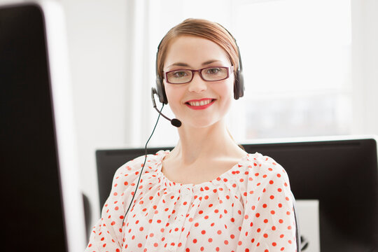 Colleagues working in a call center with a very friendly atmosphere. Munich, Germany