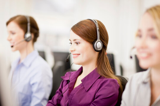Colleagues working in a call center with a very friendly atmosphere. Munich, Germany