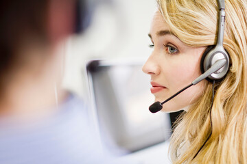 Colleagues working in a call center with a very friendly atmosphere. Munich, Germany