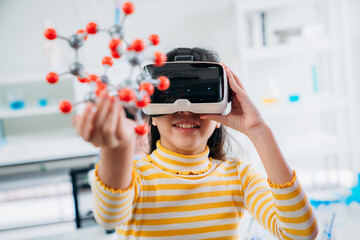 Child Explores Molecular Models with VR Glasses. Girl Wearing Reality Headset Interacts with 3D Molecule. Immersive STEM Education.