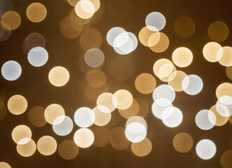 Golden blurred abstract background with golden bokeh