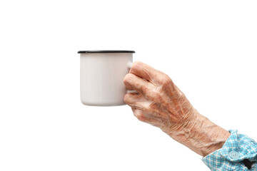 A woman holds a mug in her hand.Rheumatoid polyarthritis of the hand of a 95-year-old woman, isolated on a white background.  - obrazy, fototapety, plakaty