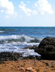 Fototapeta na wymiar Rocks on Mediterranean sea coast. Cyprus Island.