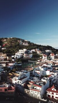 Canarian villages with charm and its Canarian architecture, Teror a village between mountains, routes through Gran Canaria recorded with drone in 4k vertical, the charm of the Canary Islands