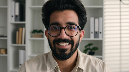 Webcam view happy Arabian indian muslim man in glasses male teacher tutor businessman talk to...
