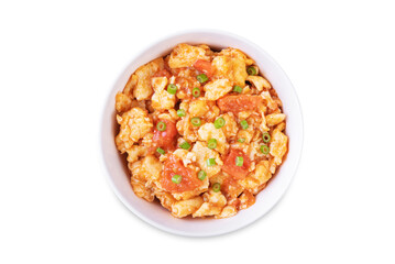 Tomato and eggs stir fry on a white isolated background