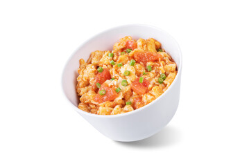 Tomato and eggs stir fry on a white isolated background