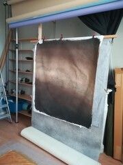 Fabrication et peinture de fonds de studio pour un studio photo