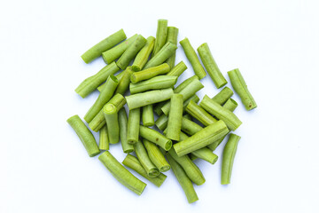Asparagus beans or Yardlong beans sliced on white background top view 