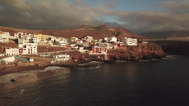 Sea and mountains in the fishing village, Gran Canaria, Sardina de G&aacute;ldar, recorded with drone 4K