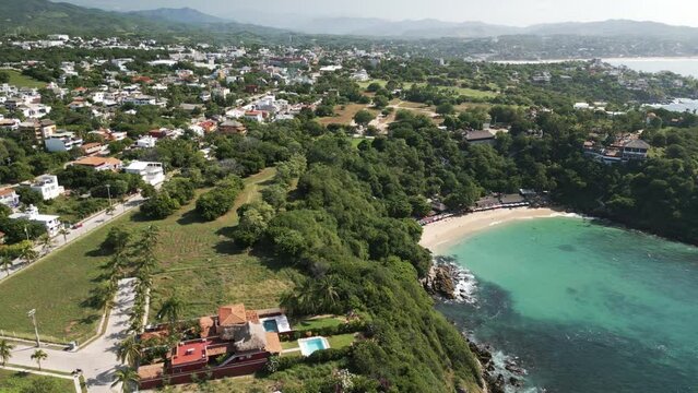 Puerto escondido drone approaching playa carrizalillo in Oaxaca coastline Mexico